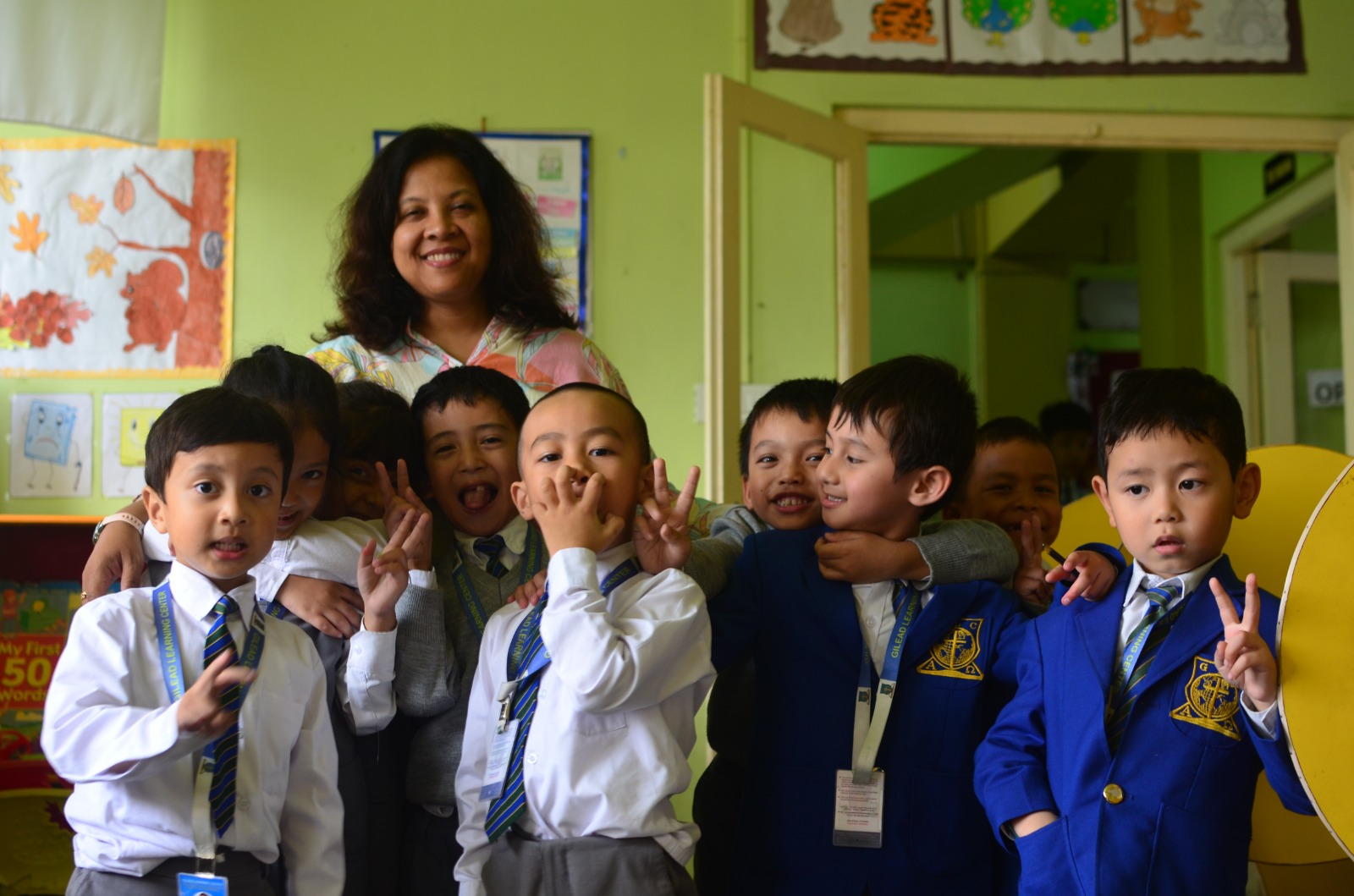 GLC Shillong students with their teacher in the classroom